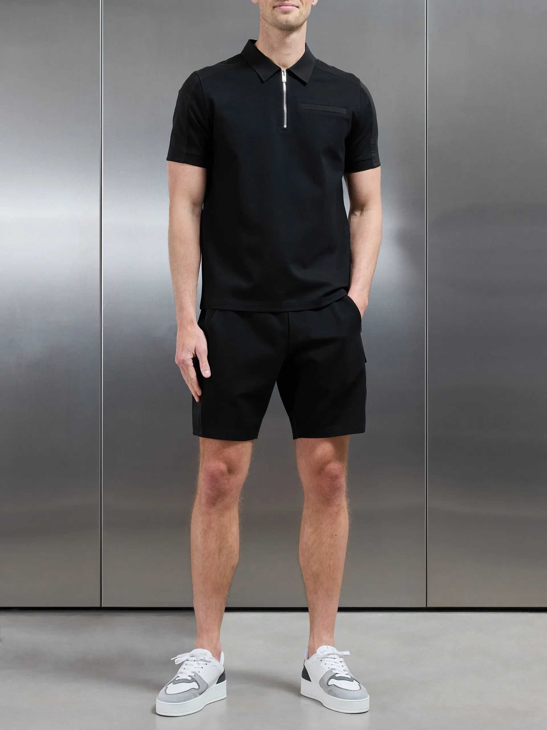 Hybrid Cargo Zip Polo Shirt in Black